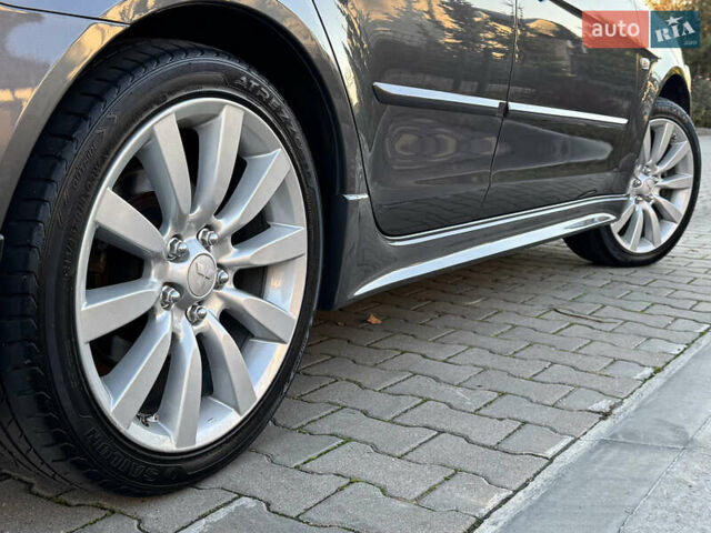 Сірий Міцубісі Lancer, об'ємом двигуна 2 л та пробігом 92 тис. км за 9800 $, фото 15 на Automoto.ua
