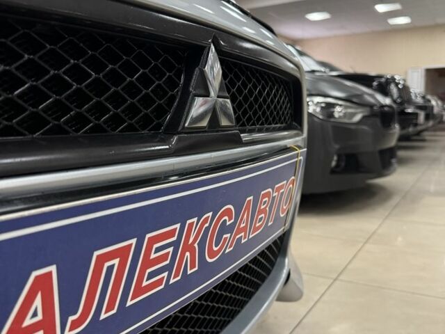 Серый Мицубиси Лансер, объемом двигателя 1.5 л и пробегом 241 тыс. км за 6400 $, фото 5 на Automoto.ua