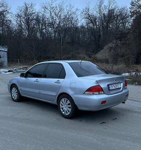 Сірий Міцубісі Lancer, об'ємом двигуна 1.58 л та пробігом 180 тис. км за 3900 $, фото 4 на Automoto.ua