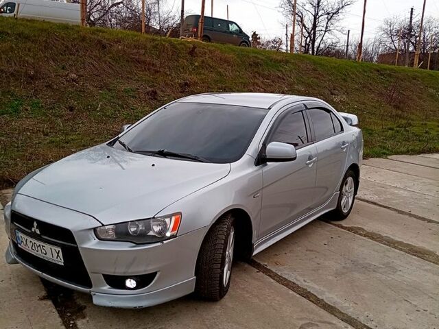 Серый Мицубиси Лансер, объемом двигателя 2 л и пробегом 243 тыс. км за 5500 $, фото 4 на Automoto.ua