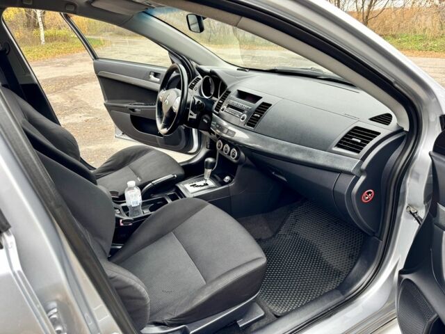 Серый Мицубиси Лансер, объемом двигателя 2 л и пробегом 225 тыс. км за 6890 $, фото 15 на Automoto.ua