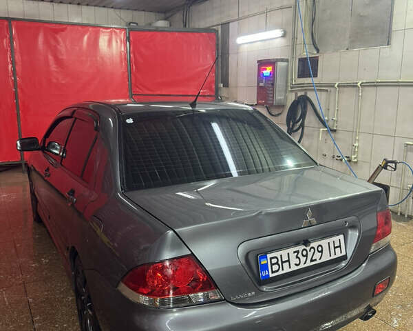 Серый Мицубиси Лансер, объемом двигателя 1.6 л и пробегом 268 тыс. км за 4600 $, фото 1 на Automoto.ua