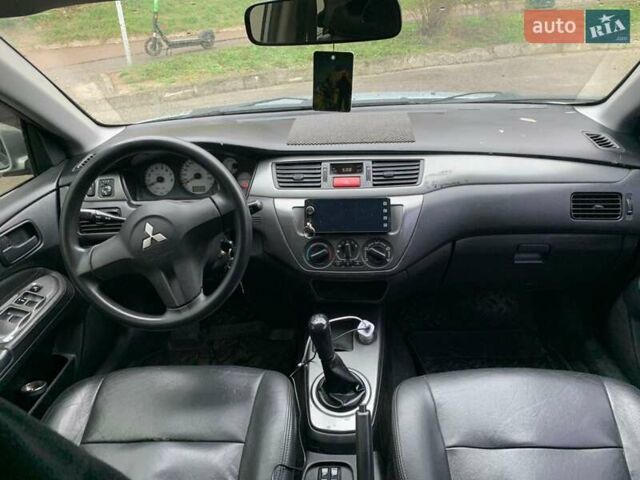 Мицубиси Лансер 2008 в Владимир-Волынский на Automoto.ua Серый Мицубиси Лансер, объемом двигателя 1.4 л и пробегом 268 тыс. км за 3700 $, фото 6 на Automoto.ua