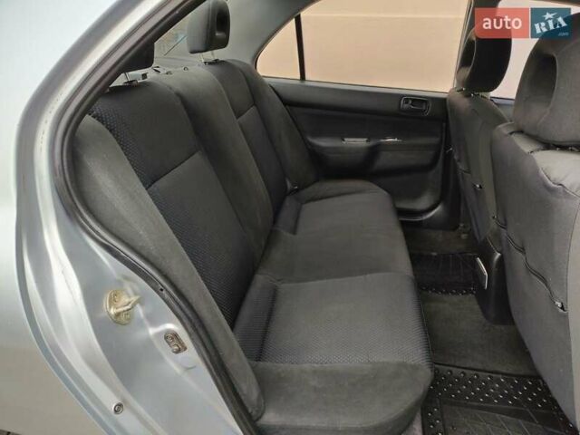 Серый Мицубиси Лансер, объемом двигателя 1.58 л и пробегом 185 тыс. км за 4700 $, фото 13 на Automoto.ua