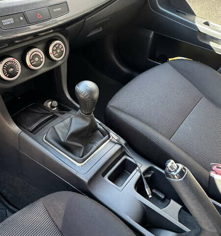 Серый Мицубиси Лансер, объемом двигателя 2 л и пробегом 190 тыс. км за 6900 $, фото 14 на Automoto.ua