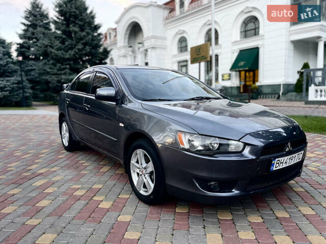 Серый Мицубиси Лансер, объемом двигателя 2 л и пробегом 212 тыс. км за 6000 $, фото 16 на Automoto.ua