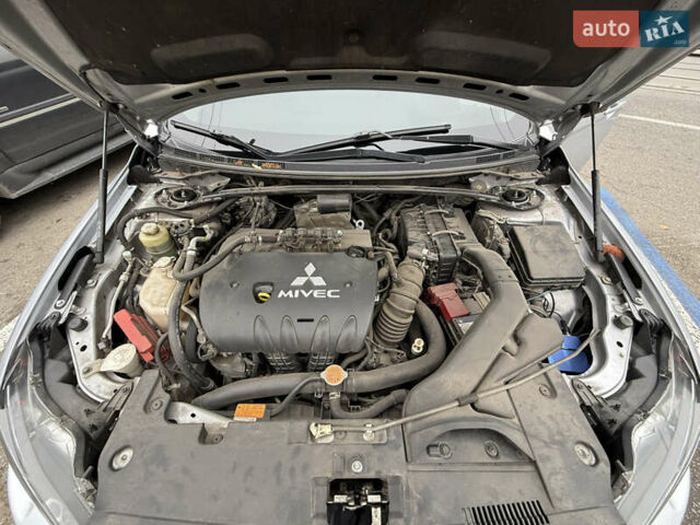 Сірий Міцубісі Lancer, об'ємом двигуна 2 л та пробігом 253 тис. км за 8700 $, фото 46 на Automoto.ua