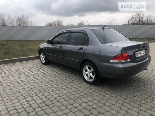 Сірий Міцубісі Lancer, об'ємом двигуна 1.58 л та пробігом 196 тис. км за 4300 $, фото 4 на Automoto.ua