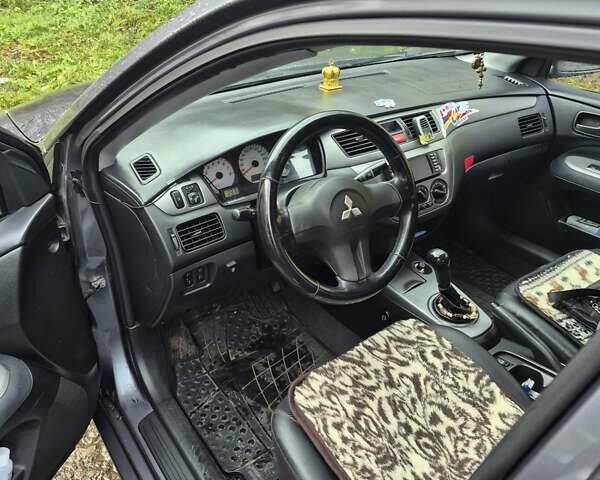 Сірий Міцубісі Lancer, об'ємом двигуна 1.6 л та пробігом 230 тис. км за 4400 $, фото 6 на Automoto.ua