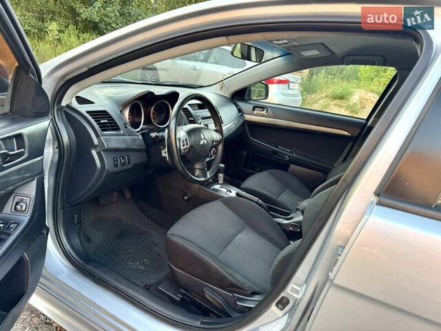 Сірий Міцубісі Lancer, об'ємом двигуна 2 л та пробігом 223 тис. км за 7390 $, фото 9 на Automoto.ua