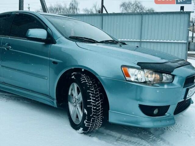 Сірий Міцубісі Lancer, об'ємом двигуна 2 л та пробігом 213 тис. км за 7300 $, фото 5 на Automoto.ua