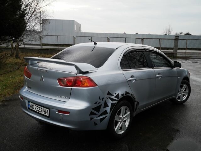 Серый Мицубиси Лансер, объемом двигателя 2 л и пробегом 260 тыс. км за 5200 $, фото 6 на Automoto.ua