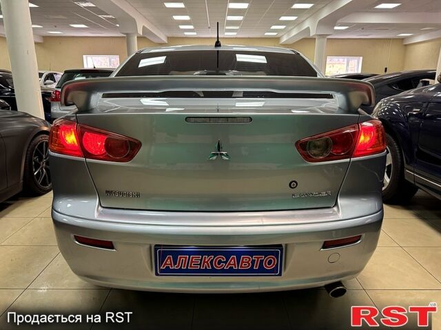 Серый Мицубиси Лансер, объемом двигателя 1.5 л и пробегом 241 тыс. км за 6400 $, фото 2 на Automoto.ua