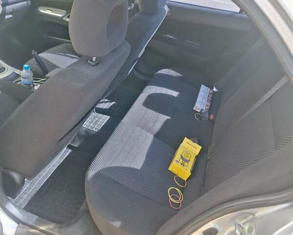 Сірий Міцубісі Lancer, об'ємом двигуна 1.6 л та пробігом 217 тис. км за 6000 $, фото 3 на Automoto.ua