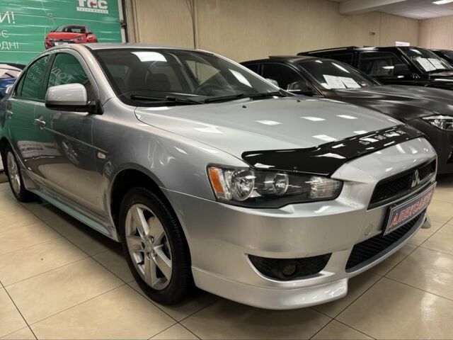 Серый Мицубиси Лансер, объемом двигателя 1.5 л и пробегом 241 тыс. км за 6400 $, фото 4 на Automoto.ua