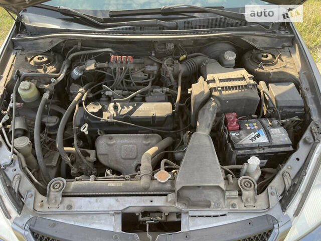 Сірий Міцубісі Lancer, об'ємом двигуна 1.6 л та пробігом 165 тис. км за 5200 $, фото 11 на Automoto.ua