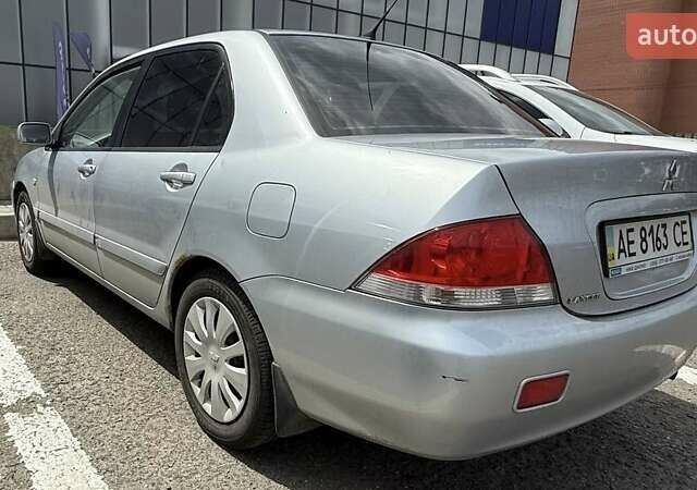 Серый Мицубиси Лансер, объемом двигателя 0 л и пробегом 175 тыс. км за 5500 $, фото 10 на Automoto.ua