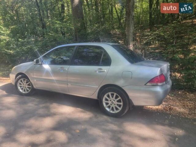 Сірий Міцубісі Lancer, об'ємом двигуна 1.6 л та пробігом 290 тис. км за 3850 $, фото 8 на Automoto.ua