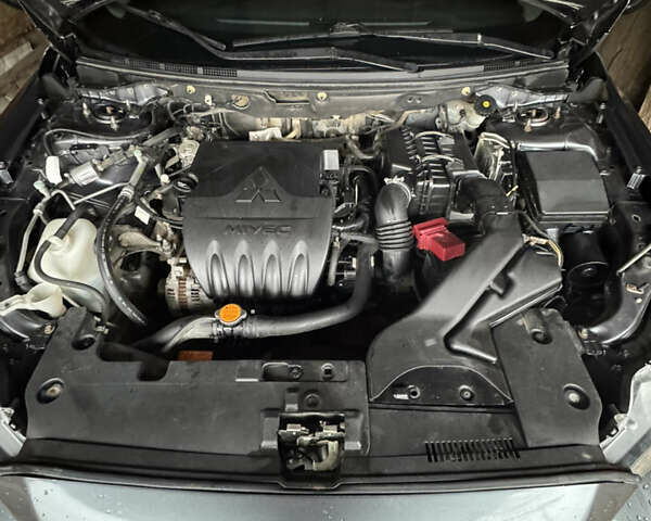 Сірий Міцубісі Lancer, об'ємом двигуна 1.5 л та пробігом 239 тис. км за 4900 $, фото 1 на Automoto.ua