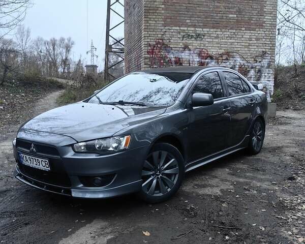Сірий Міцубісі Lancer, об'ємом двигуна 2 л та пробігом 186 тис. км за 6000 $, фото 1 на Automoto.ua
