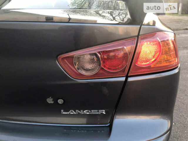 Сірий Міцубісі Lancer, об'ємом двигуна 1.5 л та пробігом 185 тис. км за 5800 $, фото 20 на Automoto.ua