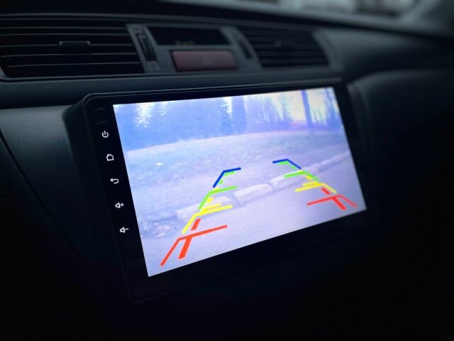 Сірий Міцубісі Lancer, об'ємом двигуна 1.6 л та пробігом 254 тис. км за 3800 $, фото 18 на Automoto.ua