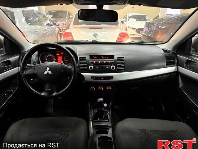 Серый Мицубиси Лансер, объемом двигателя 1.5 л и пробегом 241 тыс. км за 6400 $, фото 11 на Automoto.ua