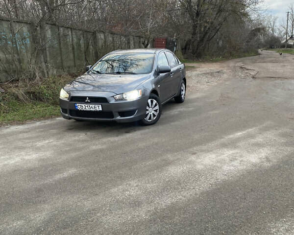 Серый Мицубиси Лансер, объемом двигателя 1.5 л и пробегом 255 тыс. км за 6500 $, фото 11 на Automoto.ua