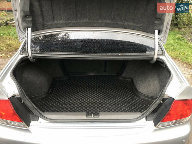 Сірий Міцубісі Lancer, об'ємом двигуна 1.58 л та пробігом 240 тис. км за 4299 $, фото 22 на Automoto.ua