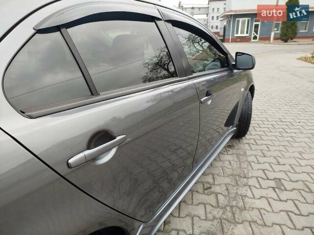Міцубісі Lancer 2008 у Хмельницькому на Automoto.ua Сірий Міцубісі Lancer, об'ємом двигуна 2 л та пробігом 157 тис. км за 6300 $, фото 54 на Automoto.ua