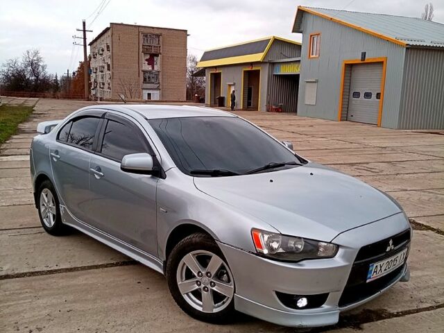 Серый Мицубиси Лансер, объемом двигателя 2 л и пробегом 243 тыс. км за 5500 $, фото 3 на Automoto.ua