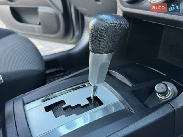 Сірий Міцубісі Lancer, об'ємом двигуна 2 л та пробігом 92 тис. км за 9800 $, фото 91 на Automoto.ua