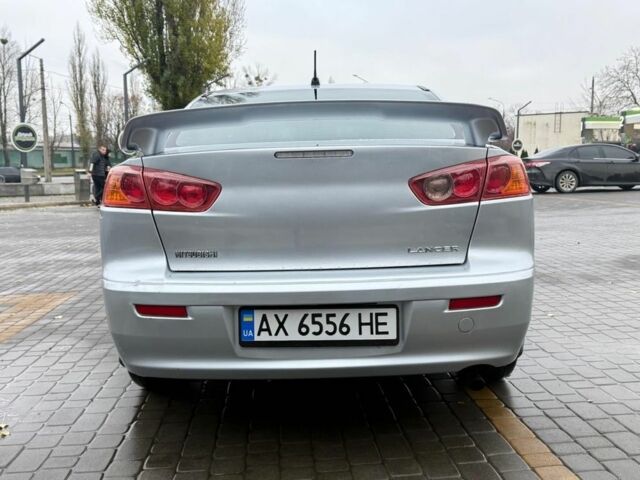 Серый Мицубиси Лансер, объемом двигателя 2 л и пробегом 210 тыс. км за 6500 $, фото 3 на Automoto.ua