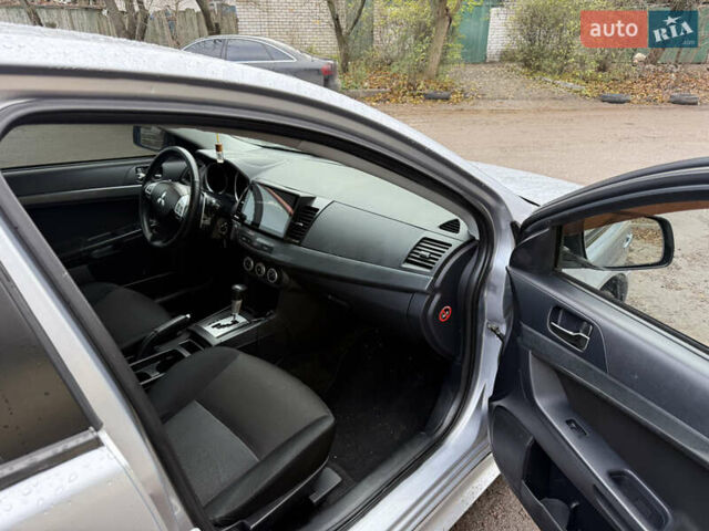 Серый Мицубиси Лансер, объемом двигателя 2 л и пробегом 265 тыс. км за 5200 $, фото 6 на Automoto.ua