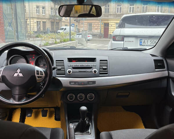 Сірий Міцубісі Lancer, об'ємом двигуна 2 л та пробігом 131 тис. км за 4899 $, фото 9 на Automoto.ua