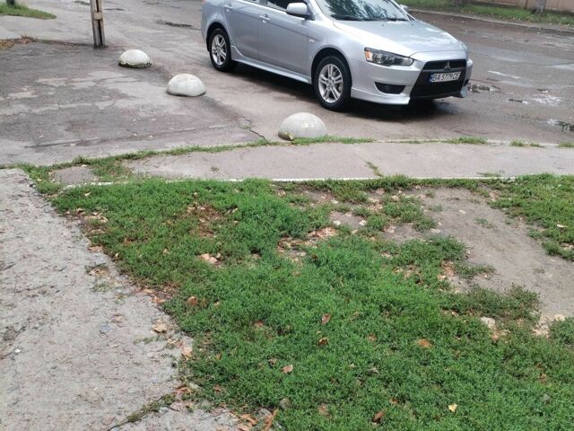 Сірий Міцубісі Lancer, об'ємом двигуна 1.5 л та пробігом 160 тис. км за 5700 $, фото 4 на Automoto.ua