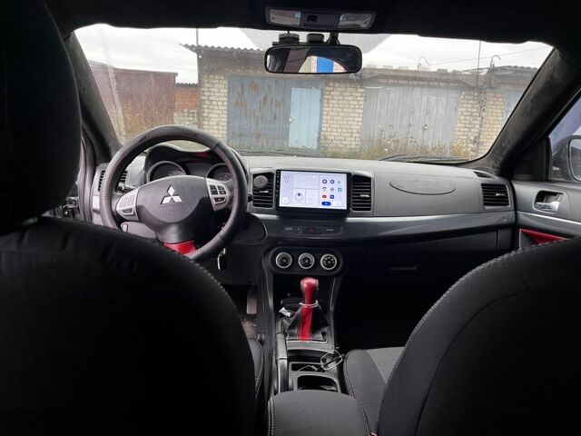 Серый Мицубиси Лансер, объемом двигателя 2 л и пробегом 224 тыс. км за 6500 $, фото 6 на Automoto.ua