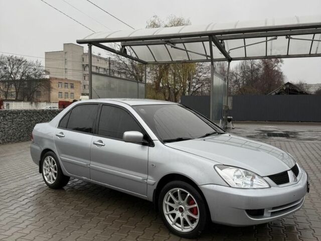 Серый Мицубиси Лансер, объемом двигателя 1.6 л и пробегом 158 тыс. км за 3150 $, фото 1 на Automoto.ua