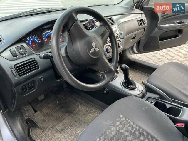Сірий Міцубісі Lancer, об'ємом двигуна 1.6 л та пробігом 260 тис. км за 4200 $, фото 12 на Automoto.ua