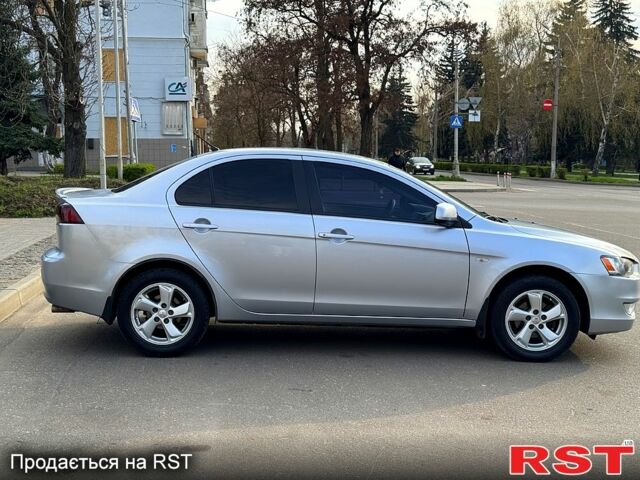 Серый Мицубиси Лансер, объемом двигателя 1.5 л и пробегом 152 тыс. км за 7800 $, фото 3 на Automoto.ua
