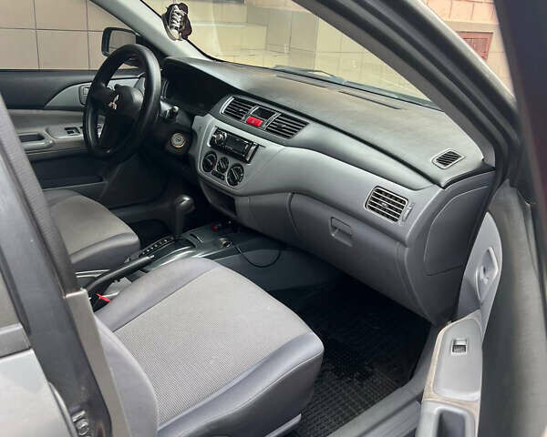 Мицубиси Лансер 2008 в Днепре (Днепропетровске) на Automoto.ua Серый Мицубиси Лансер, объемом двигателя 1.3 л и пробегом 220 тыс. км за 6000 $, фото 9 на Automoto.ua