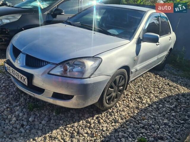 Сірий Міцубісі Lancer, об'ємом двигуна 1.6 л та пробігом 240 тис. км за 2999 $, фото 2 на Automoto.ua