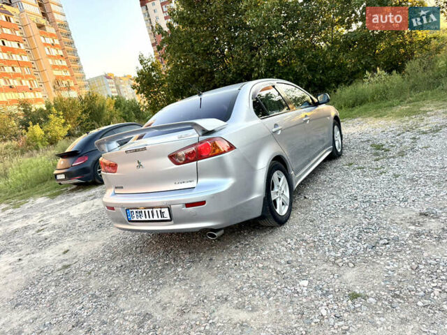 Сірий Міцубісі Lancer, об'ємом двигуна 2 л та пробігом 223 тис. км за 7390 $, фото 5 на Automoto.ua