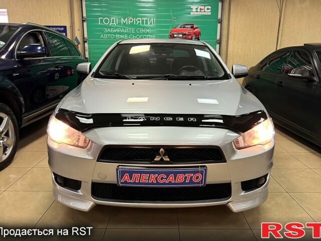 Серый Мицубиси Лансер, объемом двигателя 1.5 л и пробегом 241 тыс. км за 6400 $, фото 5 на Automoto.ua