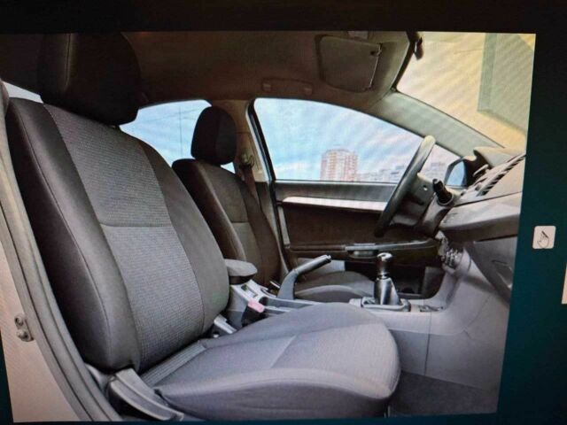 Серый Мицубиси Лансер, объемом двигателя 1.5 л и пробегом 235 тыс. км за 6500 $, фото 11 на Automoto.ua