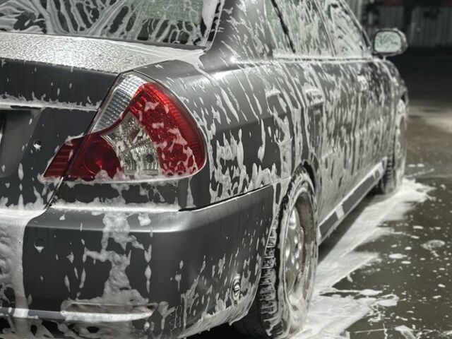 Серый Мицубиси Лансер, объемом двигателя 1.6 л и пробегом 330 тыс. км за 900 $, фото 4 на Automoto.ua