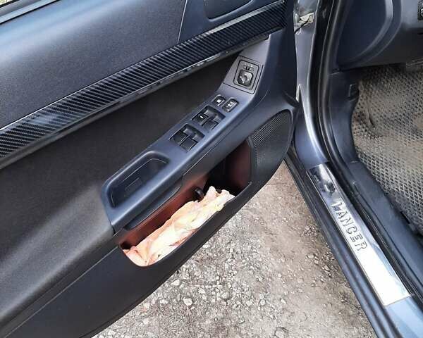 Сірий Міцубісі Lancer, об'ємом двигуна 1.5 л та пробігом 234 тис. км за 5500 $, фото 19 на Automoto.ua