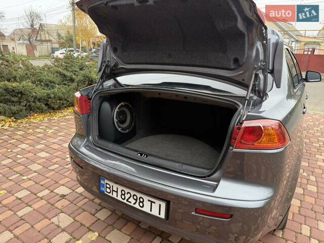 Сірий Міцубісі Lancer, об'ємом двигуна 2 л та пробігом 92 тис. км за 8200 $, фото 40 на Automoto.ua