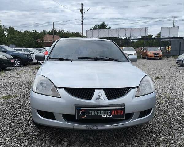 Сірий Міцубісі Lancer, об'ємом двигуна 1.6 л та пробігом 240 тис. км за 2999 $, фото 7 на Automoto.ua