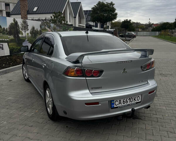 Серый Мицубиси Лансер, объемом двигателя 2 л и пробегом 211 тыс. км за 7100 $, фото 1 на Automoto.ua